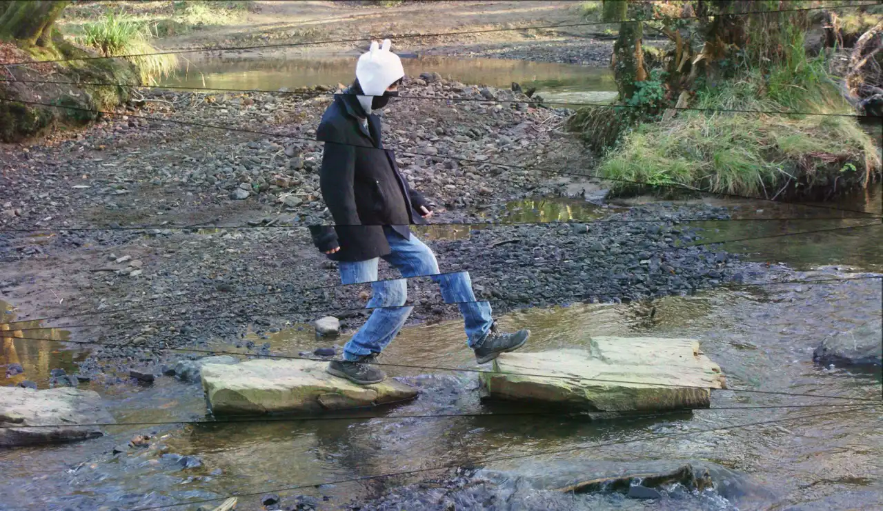 Finn jumping on rocks